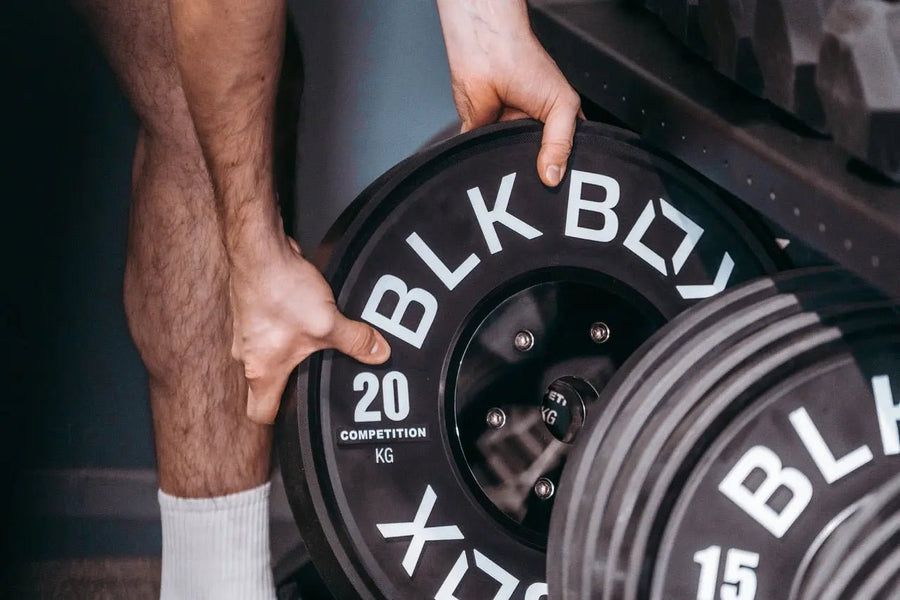 The benefits of bumper plates vs. Iron plates for strength training - BLK BOX