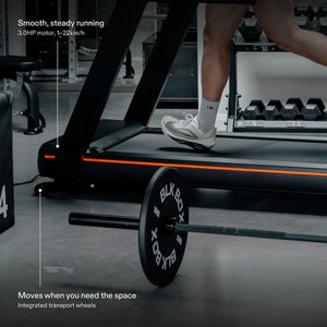 Front of the BLK BOX 1 Series Treadmill in use: 3.0HP motor for smooth, steady running and integrated transport wheels