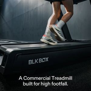 Athlete running on the BLK BOX 3 Series commercial treadmill